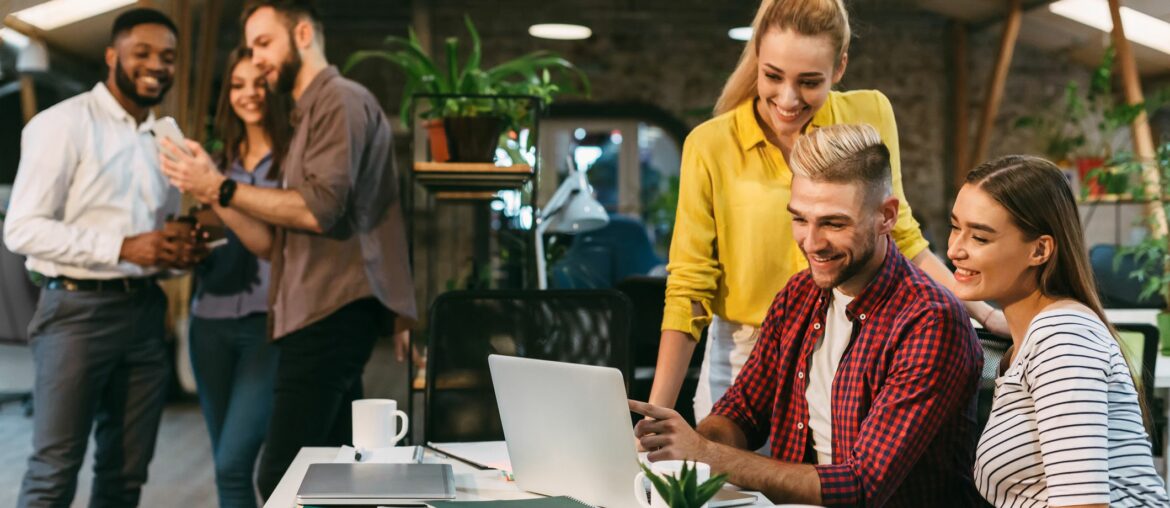 young web designers working together at modern office 1199690908 b20452b370ef4a36873d2b62fbd244c1 1