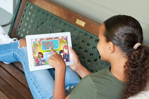 child learning from book