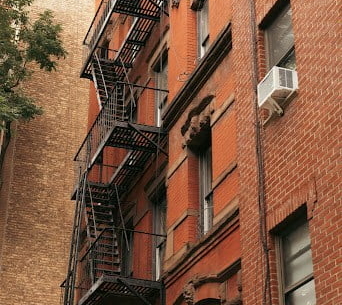 tall building red fire escape