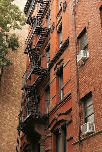 tall building red fire escape