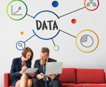 workers-working-laptop-network-graphic-overlay
