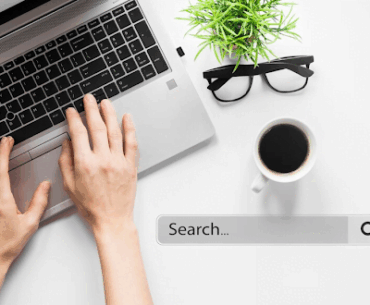 laptop spectacles coffee search